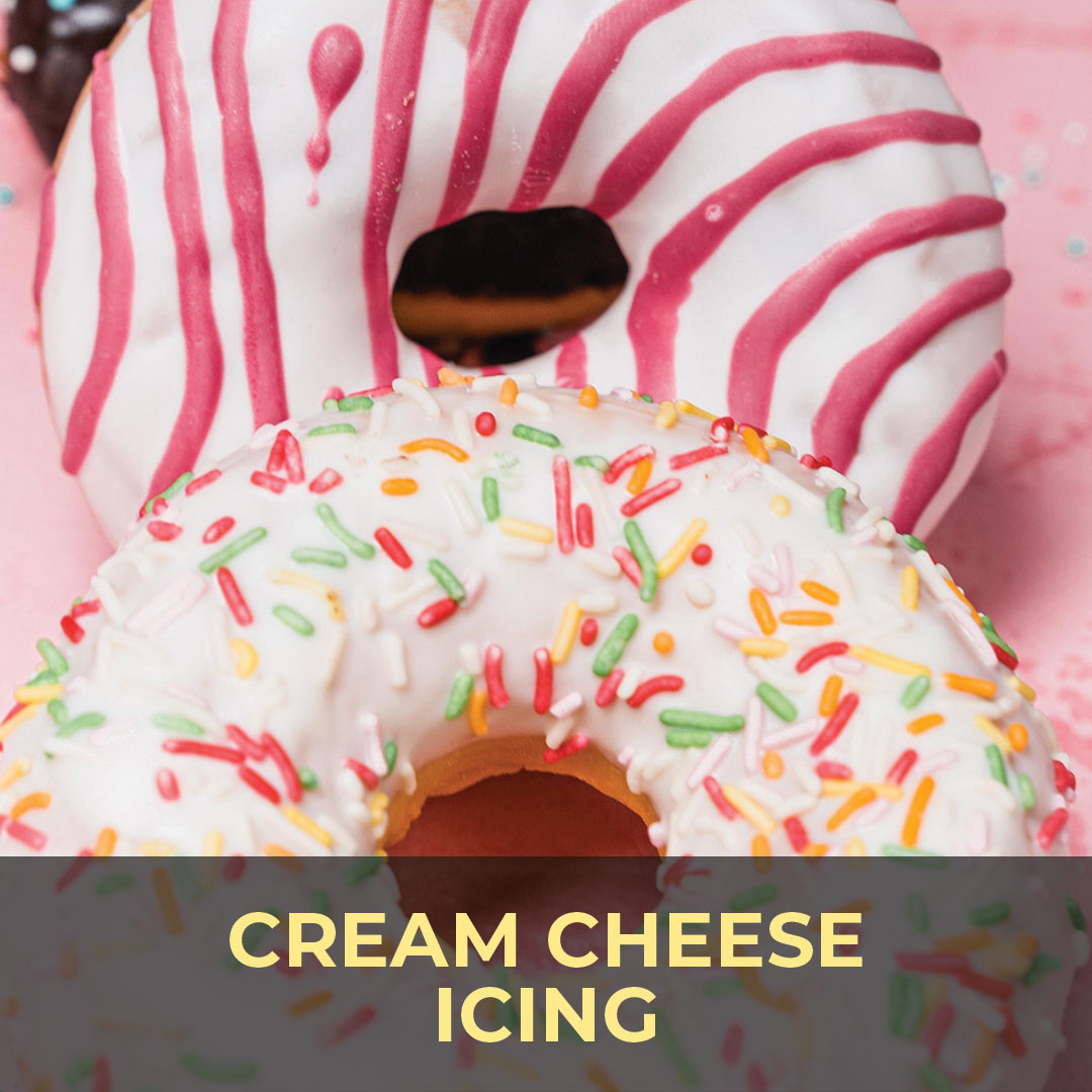 Donuts with pink-and-white icing and colorful sprinkles