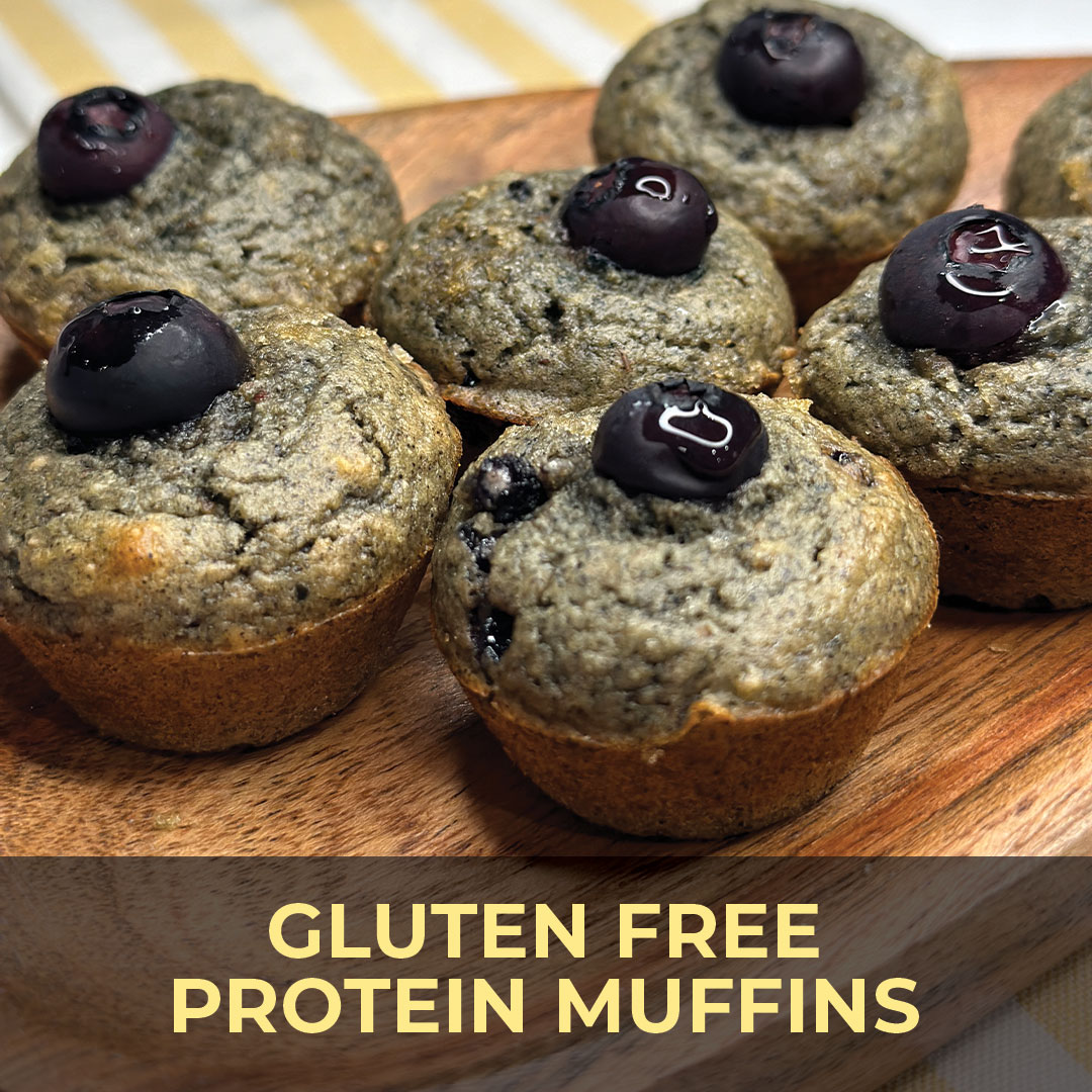 Gluten-free protein muffins topped with blueberries