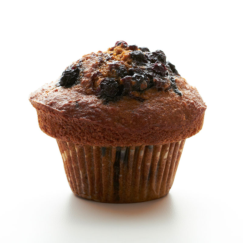 Blueberry vanilla muffin topped with blueberries