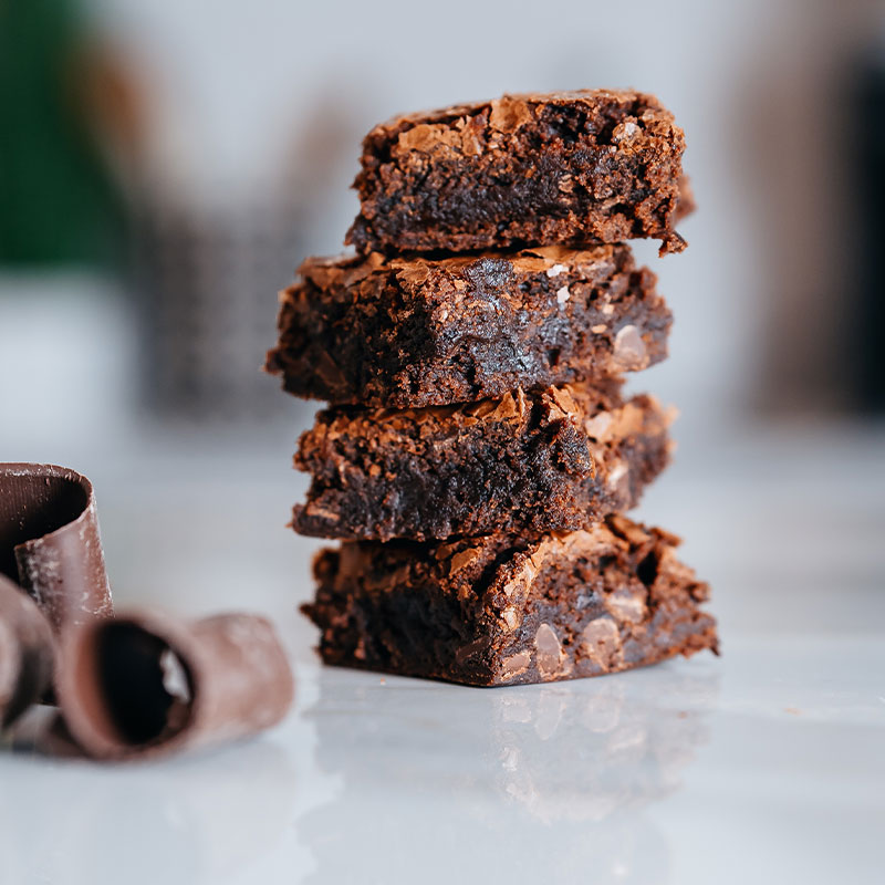 Stack of fudgy chocolate brownies