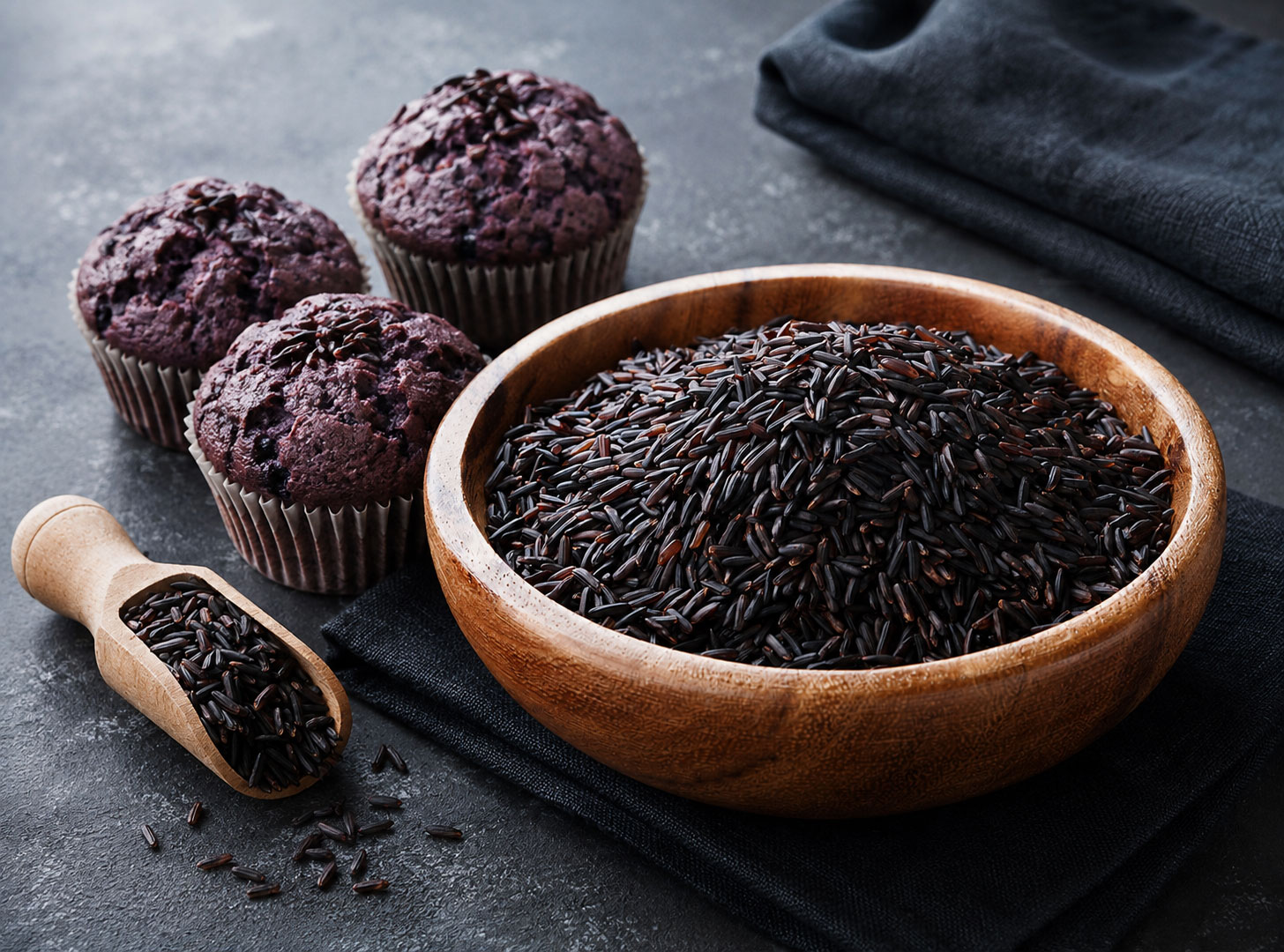 Black rice with purple-toned muffins showing how the ancient grain can be used in familiar foods